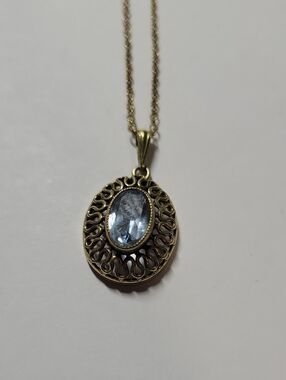 Vintage-Style Gold Tone Pendant Necklace with Light Blue Stone